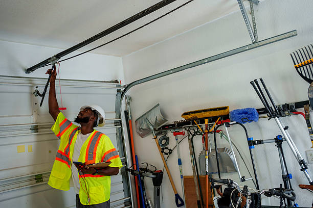 Professional Garage Door Panel Replacement technician working in Edmundson, MO